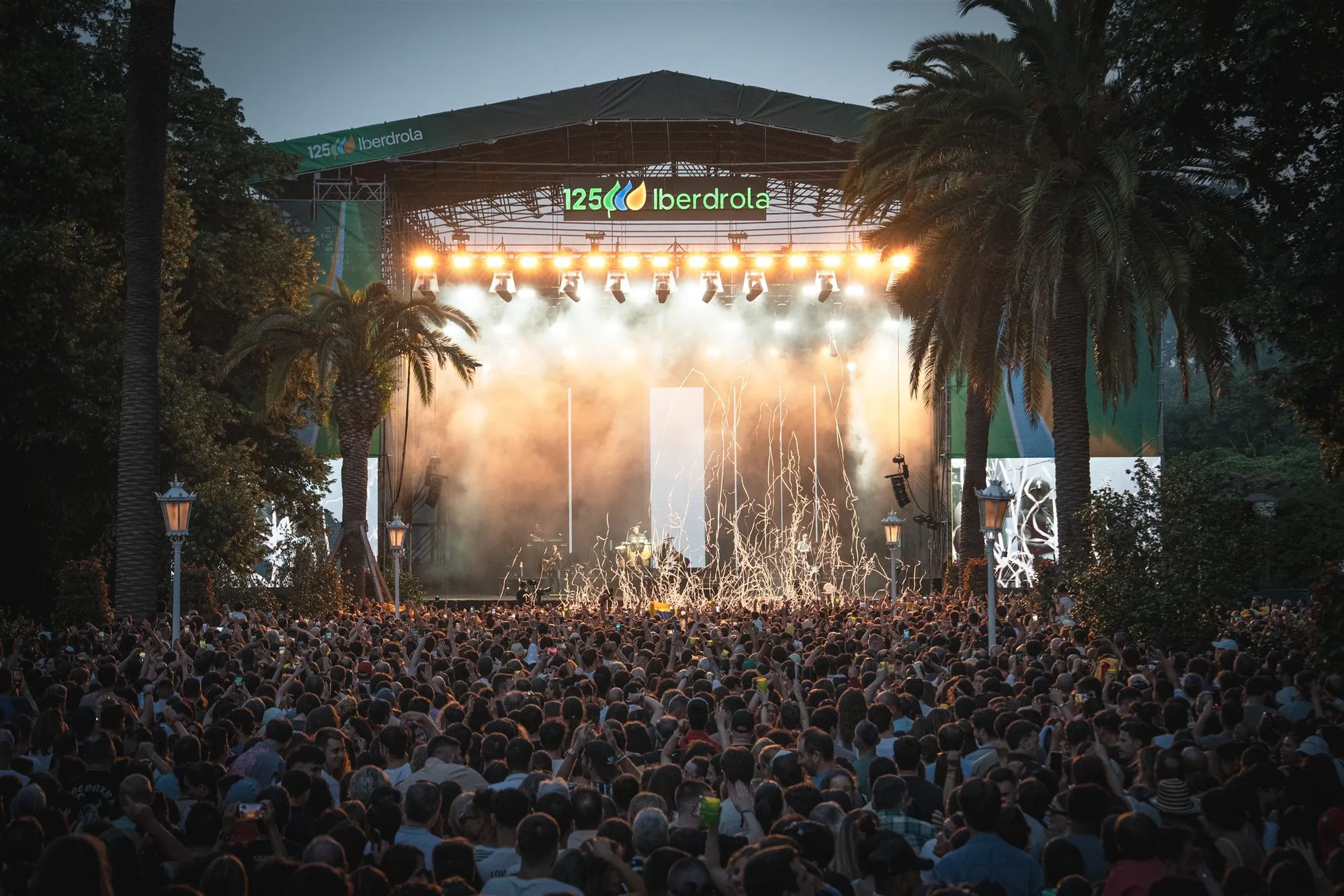 Festival crowd in front of a lit stage at night in Bilbao, photographed by Juan Actis